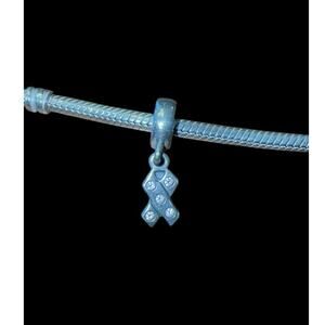 Authentic Pandora‎ breast cancer dangle charm with light pink stones